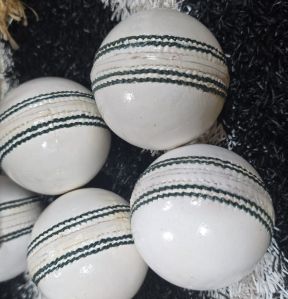 Red and White Leather Cricket Ball