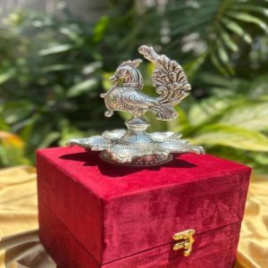 Ornate Silver Plated Peacock Diya for Pooja