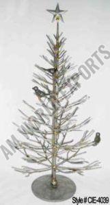 Silver Metal Christmas Tree Sculpture with Ornate Branches and Star Topper
