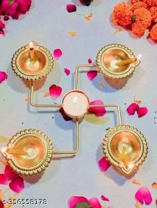 Metal Swastik Frame with Five Diya