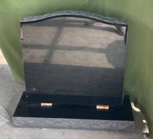 Black C Design Punched Finish Granite Monument