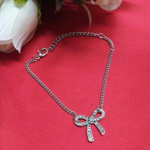 Silver-Tone Chain Bracelet with Bow Charm