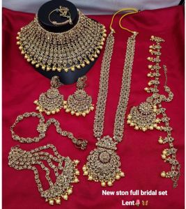Gold-Toned Stone Studded Full Bridal Jewellery Set with Choker, Long Necklace, Earrings, Maang Tikka