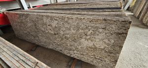 Alaska Gold White Granite Slab