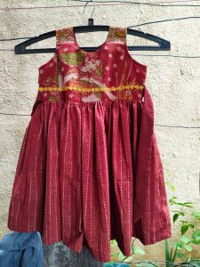 Maroon Sleeveless Cotton Printed Frock