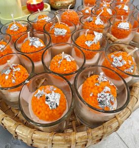 Orange Laddu Shot Candle