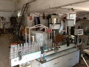 4 Head Automatic Bottle Filling Machine