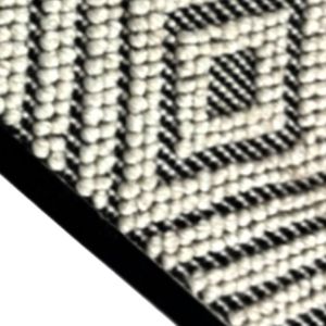 Black and Ivory Geometric Textured Woolen Carpet
