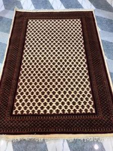 Brown Hand Knotted Woolen Carpet