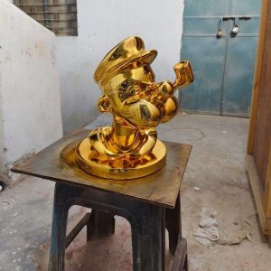 Poppy Face Sculpture