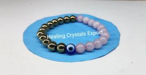 Rose Quartz Pyrite Beaded Stretch Bracelet with Evil Eye