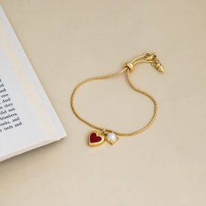 Heart and Pearl Gold Tone Adjustable Charm Bracelet