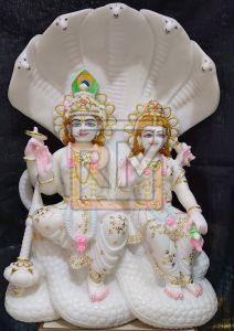 White Marble Vishnu Laxmi Sitting Statue