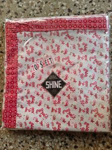 Shine 60 Topsheet