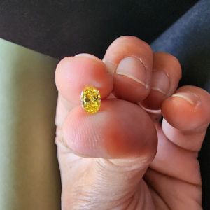 Elegant 0.37 Carat Oval Cut Fancy Yellow CVD Diamond
