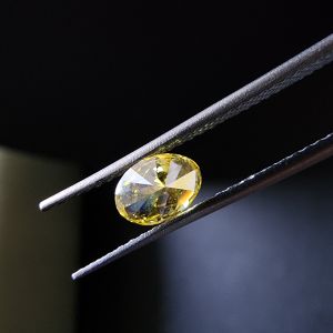 Elegant 0.37 Carat Oval Cut Fancy Yellow CVD Diamond