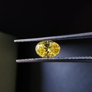 Elegant 0.37 Carat Oval Cut Fancy Yellow CVD Diamond