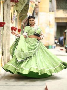 Ladies Pista Green Satin Silk Flare Lehenga Choli with Dupatta