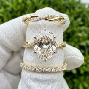 3 Ring Bridal Set With 3CT Oval E VVS2/VS1 IGI Certified Lab Grown Diamond