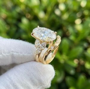 3CT Lab Grown Diamond Pear Side Stone Engagement Ring Set