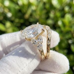3CT Lab Grown Diamond Pear Side Stone Engagement Ring Set
