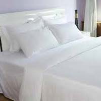 white bed sheets