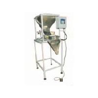 Weighmetric Filling Machine