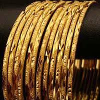 GOLD COVERING BANGLES