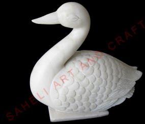 white marble duck statue
