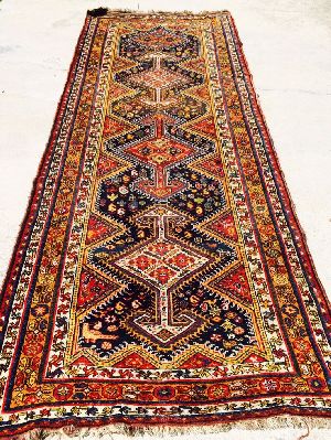 Hand knotted Woolen carpets (Tribal Design)