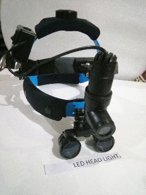 Headlight With Binocular Loupe