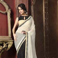 Radhika fibers black and white color brasso saree with designer blause