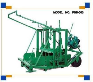 Concrete brick making machine