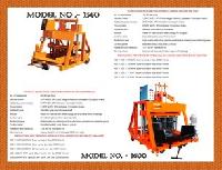 Concrete brick making machine