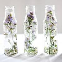 multi hued dried flowers crafted glass jar