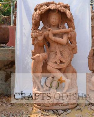 Sandstone Krishna sanding statue