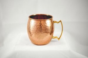 COPPER BEER MUG WITH BRASS HANDLE.