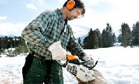 Petrol chain saws for cutting firewood and property maintenance
