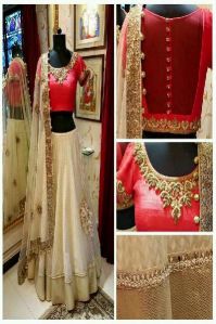 Off White & Red Net & Raw Silk Lehenga Choli