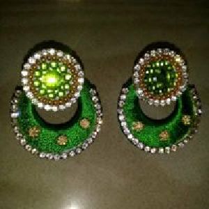 Green color silk thread earrings