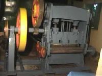 Metal perforating machine