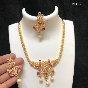 designer gold jewellery with stone studded