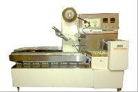 Cake Wrapping Machine