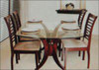 4-seater glass top dining table