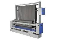 cloth rolling machine