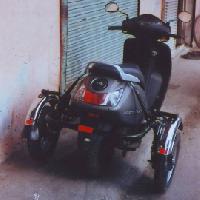 TVS JUPITER SIDE WHEEL ATTACHMENT