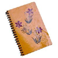 colored handmade paper diaries