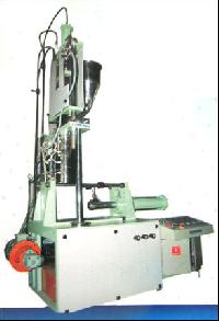 vertical screw type injection moulding machine