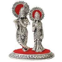 framed silver god idols