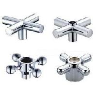 white metal faucet handle